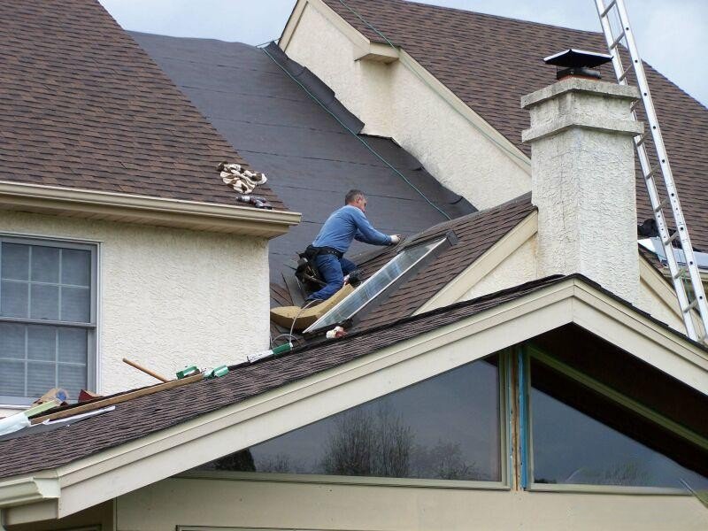 Slide of Archyk Roofing