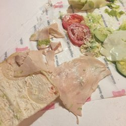 Jimmy John's - 1 whole piece of turkey, 1 slice if cheese.