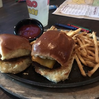 Nacho Daddy - Kids meal Burger sliders with fries. Kids up in background. - New American Near Me - Las Vegas, Nevada Nacho Daddy - Kids meal Burger sliders with fries. Kids up in background. - New American Near Me - Las Vegas, Nevada