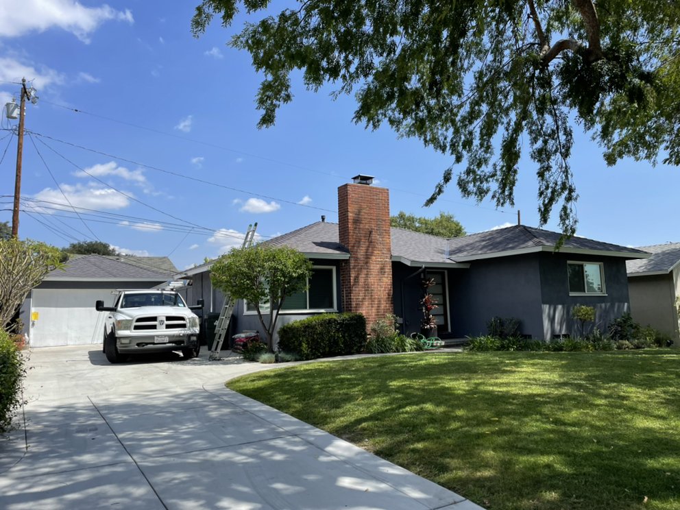 Slide of New Village Roofing