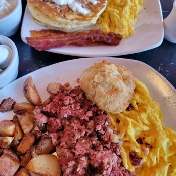 Silver Diner - Potatoes, Corned beef hash, eggs + biscuit  Banana + pecan pancake (delish!), eggs and bacon - Diners Near Me - Woodbridge, Virginia