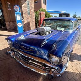 Exterior outside entrance of Valle Travel Stop & Chevron - Hot rods and vintage vehicles are on display at the north entrance. - Williams, Arizona Exterior outside entrance of Valle Travel Stop & Chevron - Hot rods and vintage vehicles are on display at the north entrance. - Williams, Arizona
