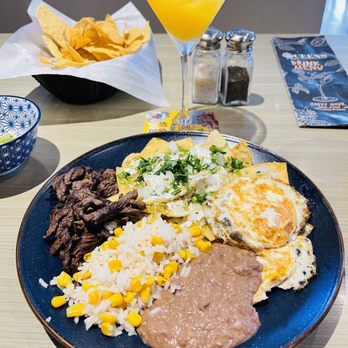 Queens Bar & Grill - Chilaquilles and a Queens Margarita. - Mexican Near Me - Fayetteville, Arkansas Queens Bar & Grill - Chilaquilles and a Queens Margarita. - Mexican Near Me - Fayetteville, Arkansas