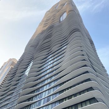 Radisson Blu Aqua Chicago - From the outdoor area looking to the top - Hotels Near Me - Chicago, Illinois Radisson Blu Aqua Chicago - From the outdoor area looking to the top - Hotels Near Me - Chicago, Illinois
