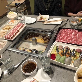 Haidilao Hotpot Flushing - Spicy and pork bone broth with assorted beef and meatballs - Hot Pot Near Me - Flushing, New York Haidilao Hotpot Flushing - Spicy and pork bone broth with assorted beef and meatballs - Hot Pot Near Me - Flushing, New York