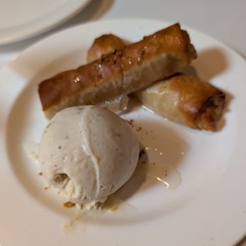 Evvia Estiatorio - Galaktoboureko Traditional phyllo wrapped vanilla bean semolina custard with pistachio ice cream 16.00 - Greek Near Me - Palo Alto, California