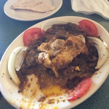 Caspian Grill - Roasted eggplant appetizer with fried egg - Persian/Iranian Near Me - Austin, Texas Caspian Grill - Roasted eggplant appetizer with fried egg - Persian/Iranian Near Me - Austin, Texas