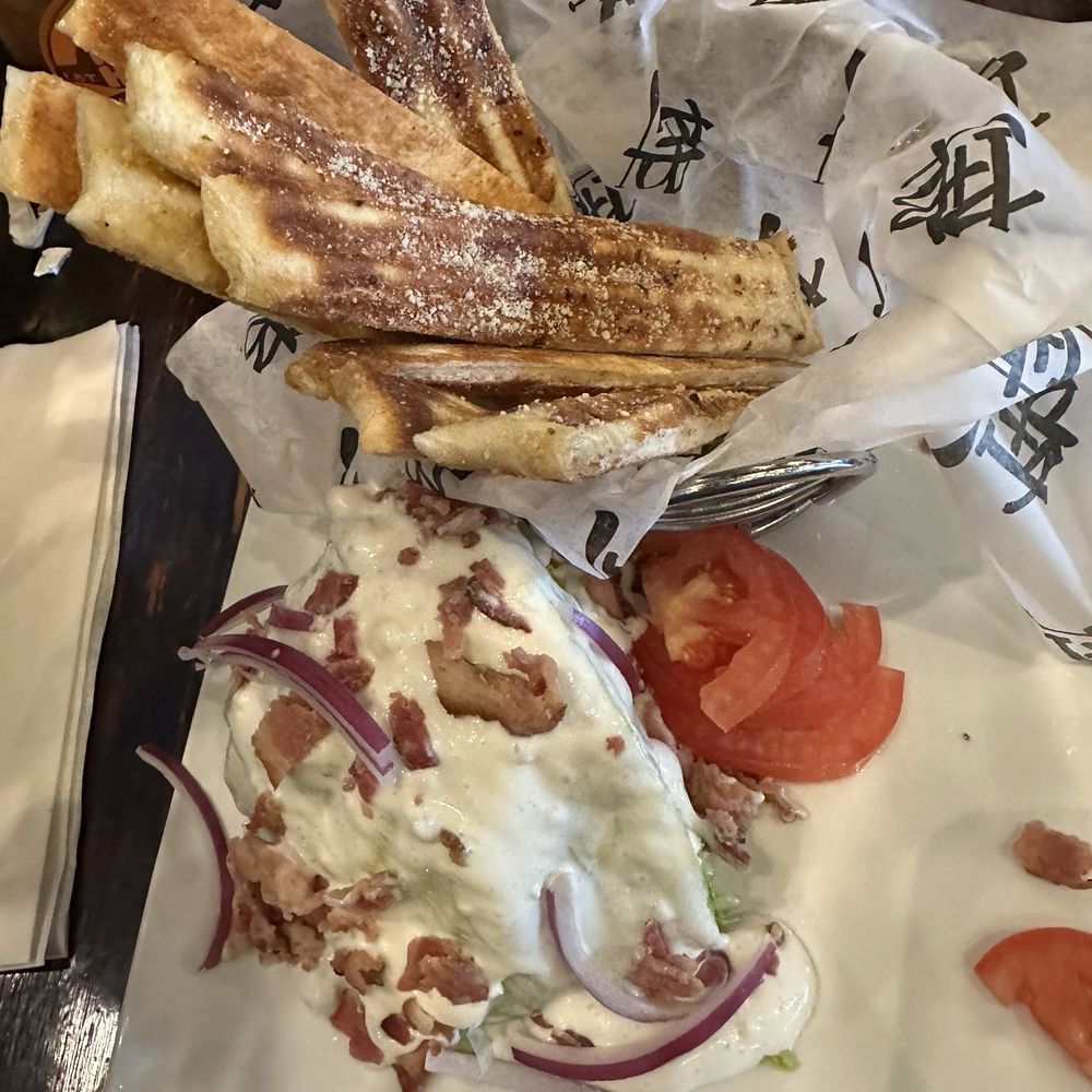 Paddle Hard Brewing - Wedge salad with bread basket - Breweries Near Me - Grayling, Michigan