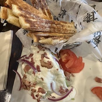 Paddle Hard Brewing - Wedge salad with bread basket - Breweries Near Me - Grayling, Michigan