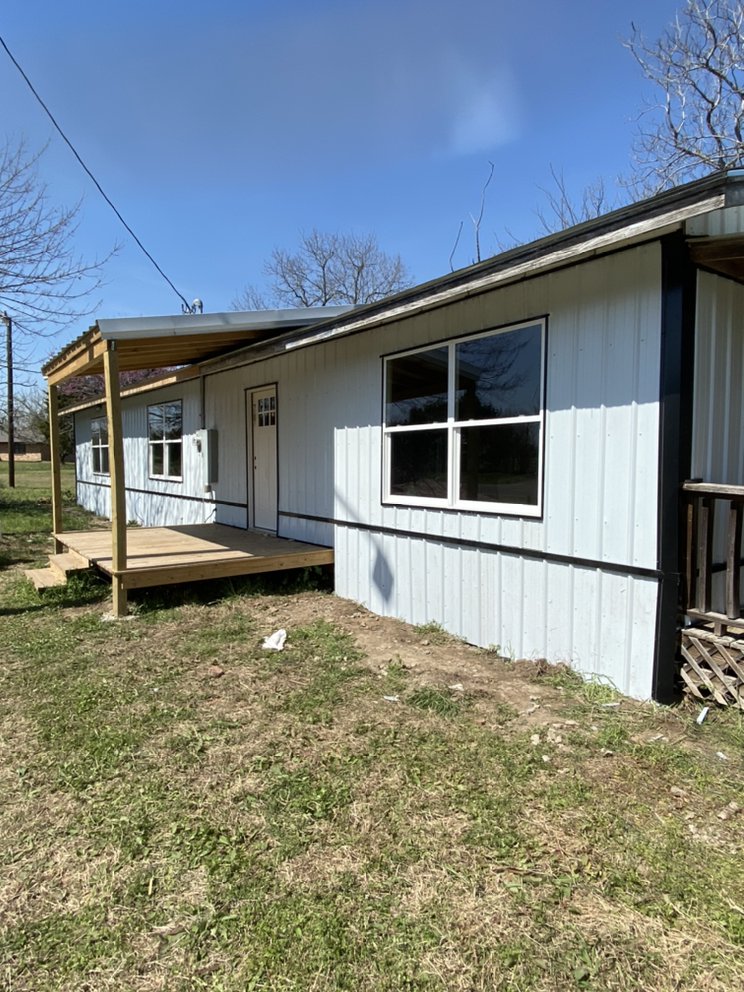 Slide of Elevate Roofing & Builders