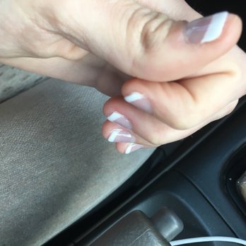 Sam Nails - On almost every nail the white extends over the edge. This is going to peel within the next few days. - Nail Salons Near Me - Bryan, Texas