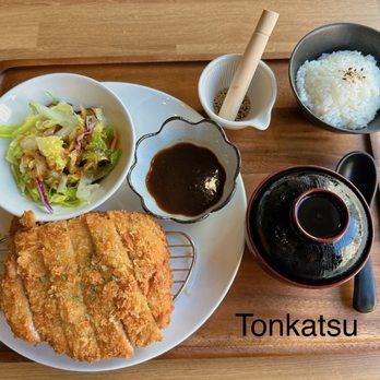 Sushi AOI - a plate of food on a wooden tray - Japanese Near Me - Calgary, Alberta