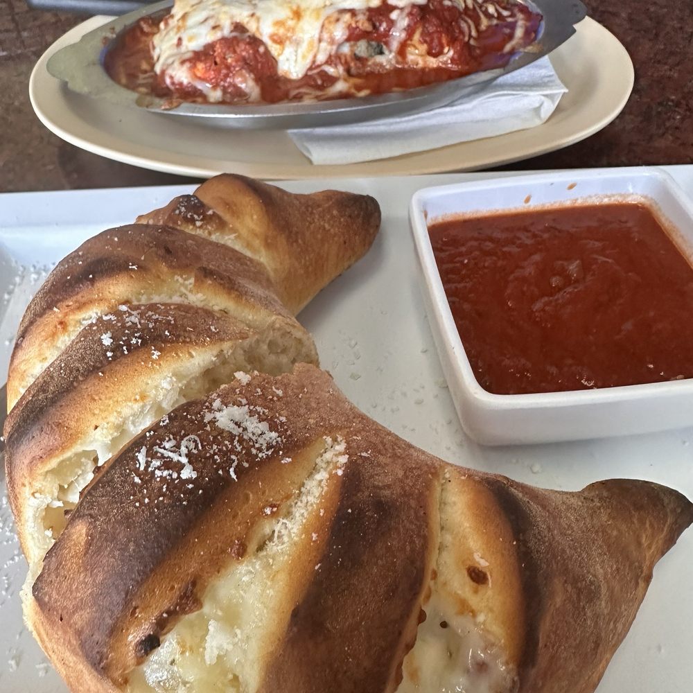Pizza D'Oro - Calzone and Husband had Lasagna. - Pizza Near Me - Huntington Beach, California Pizza D'Oro - Calzone and Husband had Lasagna. - Pizza Near Me - Huntington Beach, California