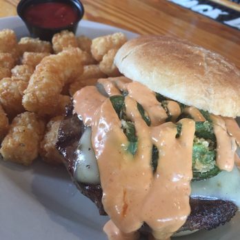Flip Flops Grill + Chill - Firecracker burger is on point. Their special sauce makes this burger special. - Caribbean Near Me - Virginia Beach, Virginia Flip Flops Grill + Chill - Firecracker burger is on point. Their special sauce makes this burger special. - Caribbean Near Me - Virginia Beach, Virginia