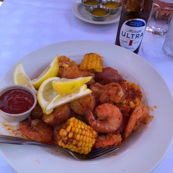 The Crab Pot - Shrimp boil with potatoes and corn - Seafood Near Me - Seattle, Washington The Crab Pot - Shrimp boil with potatoes and corn - Seafood Near Me - Seattle, Washington
