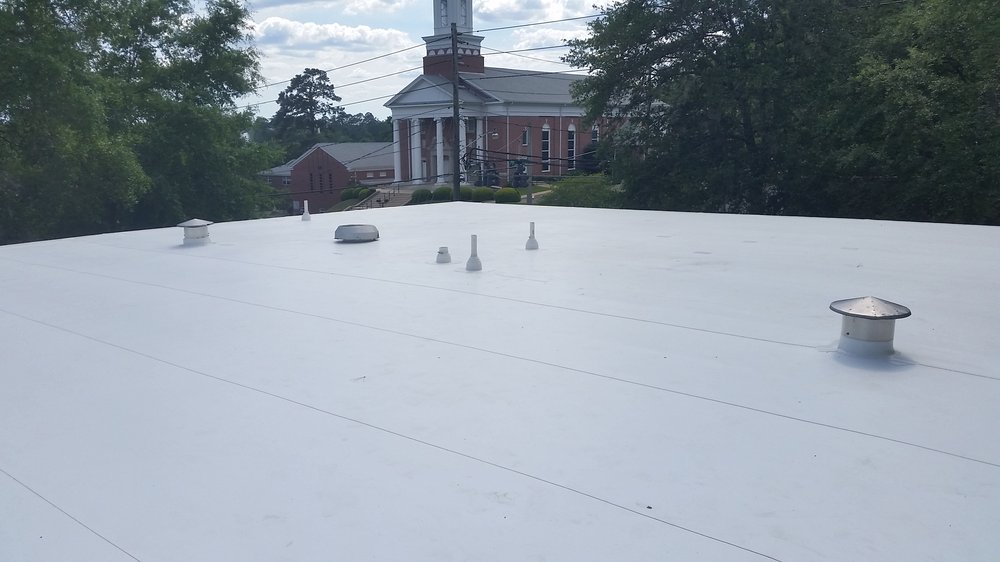 Slide of Total Quality Roofing