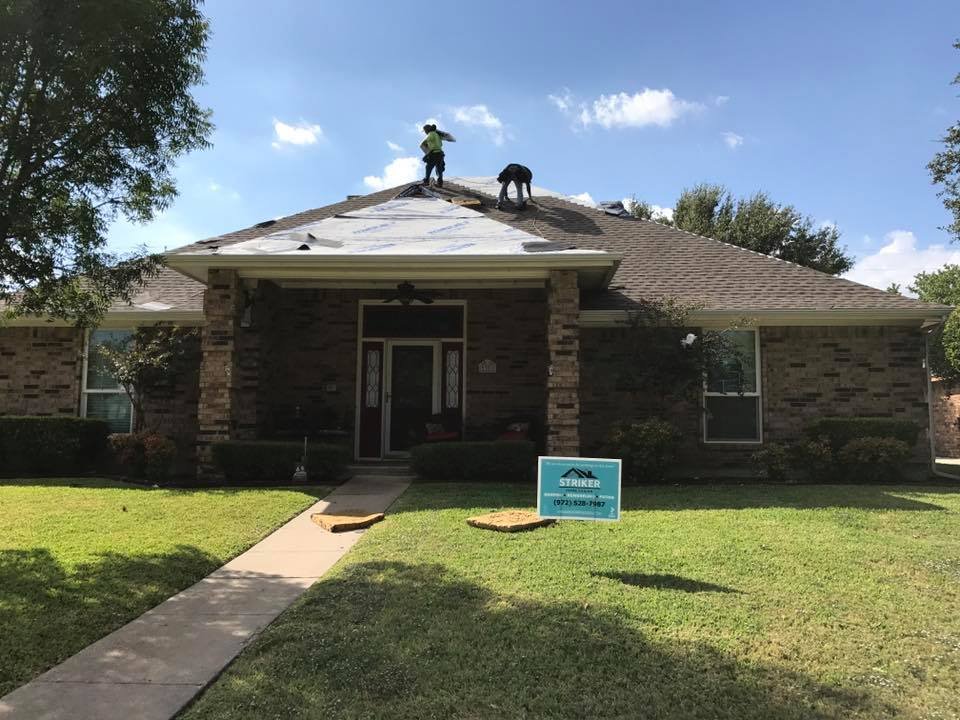 Slide of Striker Roofing & Construction