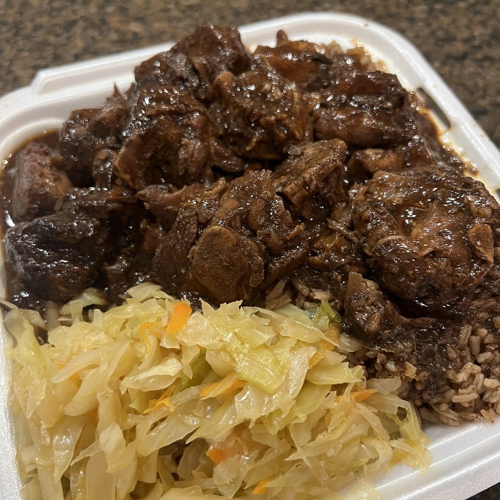 Topclass Jamaican Bar & Grill - Brown Stew Chicken - Caribbean Near Me - Orlando, Florida Topclass Jamaican Bar & Grill - Brown Stew Chicken - Caribbean Near Me - Orlando, Florida