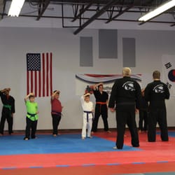 Southern Minnesota Martial Arts - Sporting their colorful summer uniforms, working hard indoors when its too hot to be having fun outdoors.