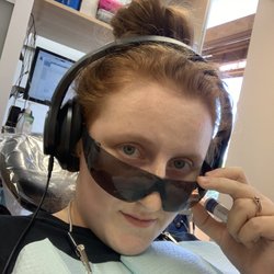 Advanced Endodontic Therapy - Me with my fancy headphones and glasses! My lips covered in chapstick too before they started working on my tooth.