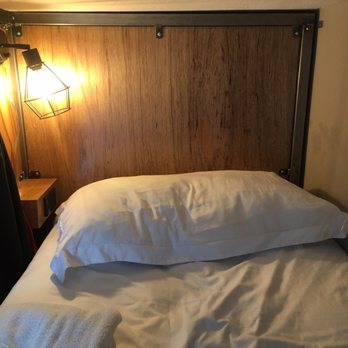 Ember Hostel - Bed, power outlet, lamp, blackout curtain, towel, comfy pillow - Hostels Near Me - Denver, Colorado