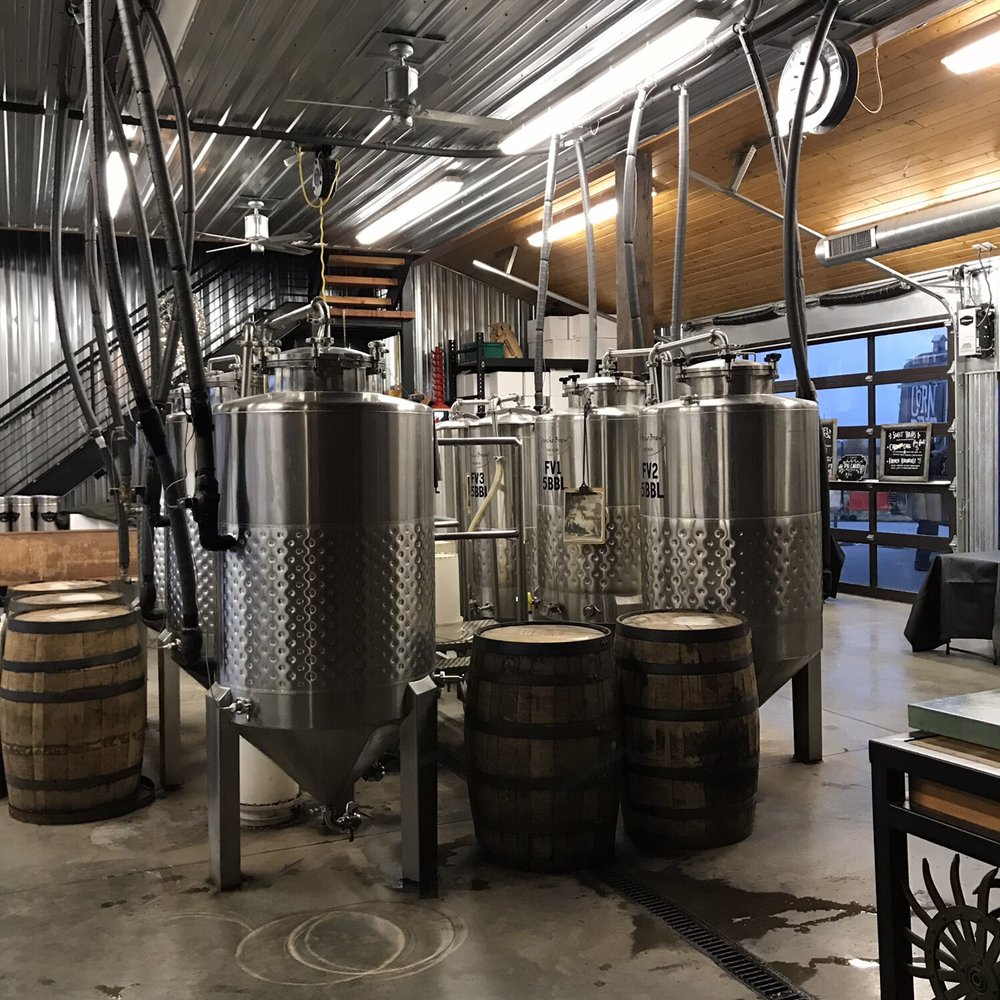 Alluvial Brewing - Brewing tanks in back room - Breweries Near Me - Ames, Iowa