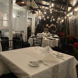 The Tides Restaurant - Enclosed patio with heaters. Was comfortable on a 60 degree evening.