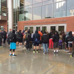 Taken at 10:28 on Saturday Jan 22. Gym was supposed to open at 10:00, but the employee didn't show up so we all had to wait in the rain.