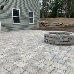 CB Property Maintenance - 20' x 20' paver patio with fireplace for a wonderful customer in Wells.