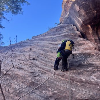 Rock Odysseys - Our guide helping down our nervous 6yr old. - Rock Climbing Near Me