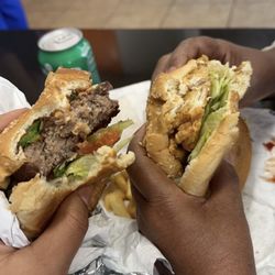 Quickie’s Burgers, Wings & Seafood - A CRISPY CHICKEN SANDWICH Quickies Deluxe Burger