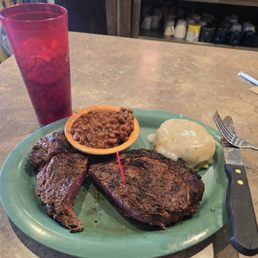 Ribeye with mashed potato & beans. It was yummy Ribeye with mashed potato & beans. It was yummy