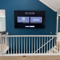 LP TV Install - Tv on full motion mount and electrical outlet was made behind it
