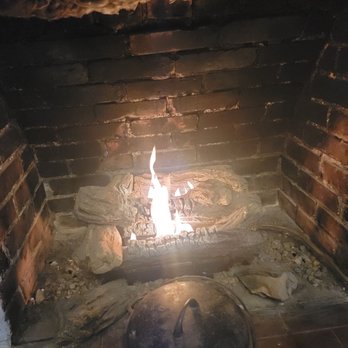 Baabals Ice Cream Shoppe - Fireplace in the seating area. - Ice Cream & Frozen Yogurt Near Me - Fletcher, North Carolina