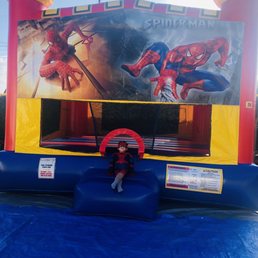 The birthday boy and his bounce house.