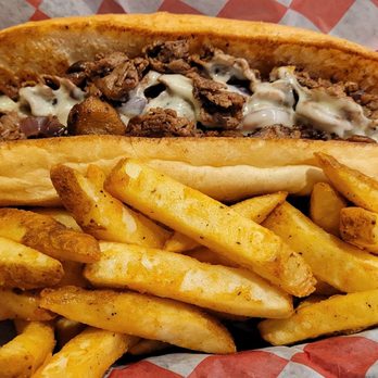 The Vig - a sandwich and french fries - Sports Bars Near Me - Providence, Rhode Island