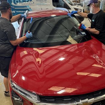 Glass Services - New windshield being place in vehicle - Auto Glass Services Near Me - Shreveport, Louisiana Glass Services - New windshield being place in vehicle - Auto Glass Services Near Me - Shreveport, Louisiana