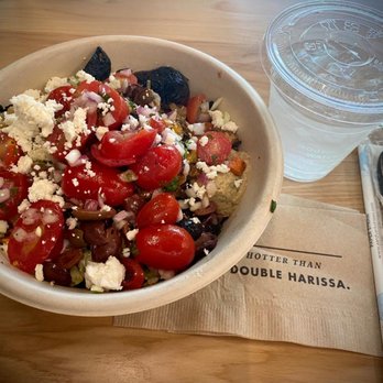 CAVA - Super Greens, Black Lentils, Grilled Chicken, Eggplant Dip, Tzatziki, Hummus, Roasted Veggies, Tomato-Onion Salad, Kalamata Olives & Feta - Mediterranean Near Me - Los Angeles, California