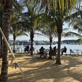 Bowleys On The Bay - Outdoor beach seating - New American Near Me - Middle River, Maryland