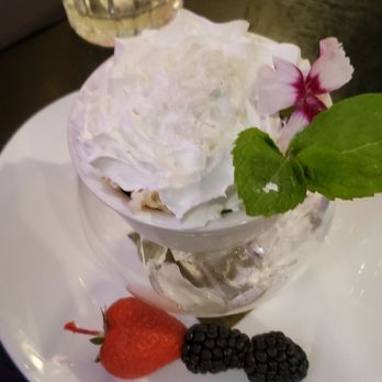 Mamajuana Cafe - Coconut tres leches, light and fluffy. Very nice - Latin American Near Me - Houston, Texas Mamajuana Cafe - Coconut tres leches, light and fluffy. Very nice - Latin American Near Me - Houston, Texas