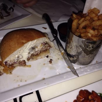 Engine No 9 - My half eaten Demi-God burger with curly fries. Enjoyed the Wine-O burger better, and definitely get the tots! - Burgers Near Me - Saint Petersburg, Florida Engine No 9 - My half eaten Demi-God burger with curly fries. Enjoyed the Wine-O burger better, and definitely get the tots! - Burgers Near Me - Saint Petersburg, Florida