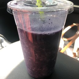 a smoothie in a plastic cup a smoothie in a plastic cup