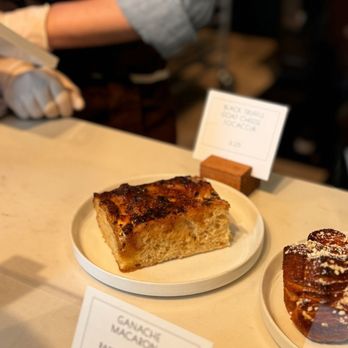 T55 Patisserie - Black Truffle Goat Cheese Foccacia - Desserts Near Me - Bothell, Washington T55 Patisserie - Black Truffle Goat Cheese Foccacia - Desserts Near Me - Bothell, Washington