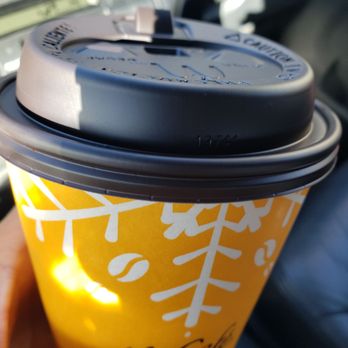 McDonald's - a hand holding a cup of coffee - Fast Food Near Me - Albuquerque, New Mexico