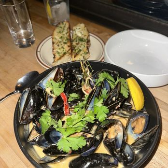 Otis - PEI mussels with chorizo piquillo pepper broth - New American Near Me - Brooklyn, New York