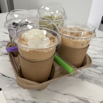 Brew K Cafe - three cups of iced coffee on a tray - Coffee & Tea Near Me - Cibolo, Texas Brew K Cafe - three cups of iced coffee on a tray - Coffee & Tea Near Me - Cibolo, Texas