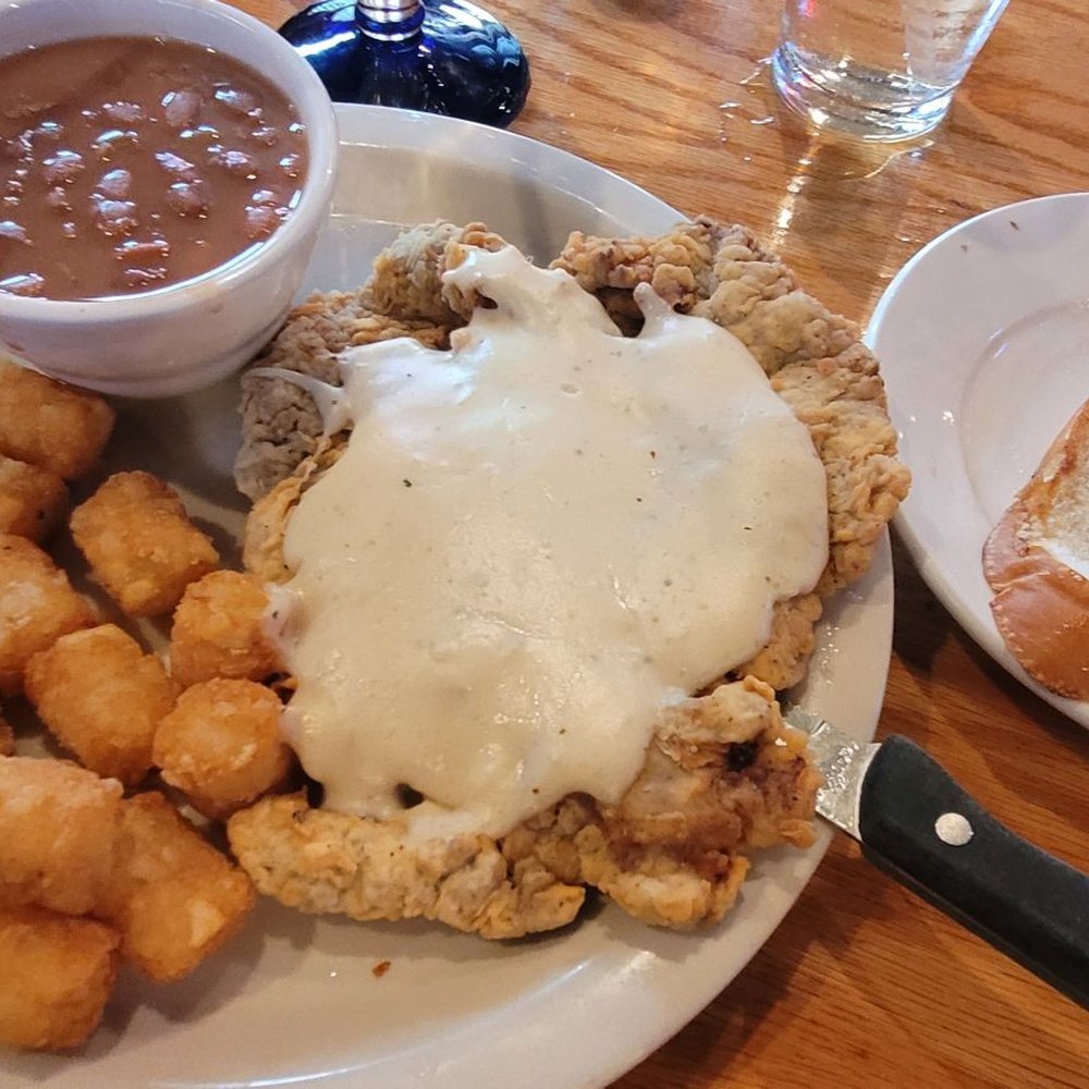 Main Street Cafe - Nice size portion of chicken fried steak with tots and pinto beans. - Cafes Near Me - Lewisville, Texas Main Street Cafe - Nice size portion of chicken fried steak with tots and pinto beans. - Cafes Near Me - Lewisville, Texas