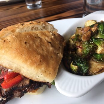 Blind Tiger Pub - Steak sandwich and Brussels. Sides are not included with your sandwich. - American Near Me - Charleston, South Carolina