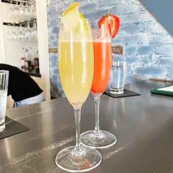 Grafted Wine Bar & Lounge - Pear and strawberry mimosas - Cocktail Bars Near Me - Belleville, Illinois Grafted Wine Bar & Lounge - Pear and strawberry mimosas - Cocktail Bars Near Me - Belleville, Illinois