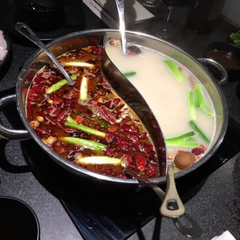 Happy Lamb Hot Pot - Broth's here! Half n Half. So much debri - get ready to search and rescue your food. - Mongolian Near Me - Edison, New Jersey
